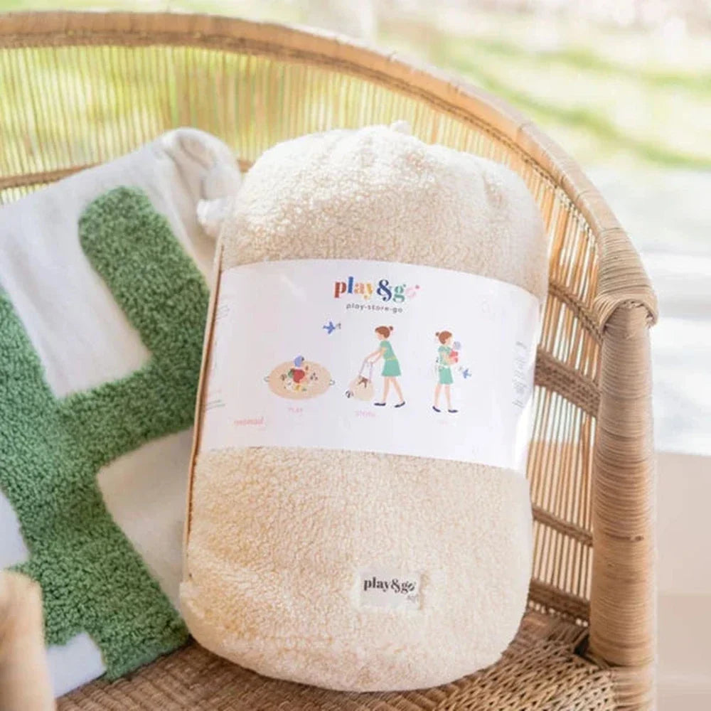 Zachte havertinten teddy stof van het Play&Go Soft speelkleed van dichtbij