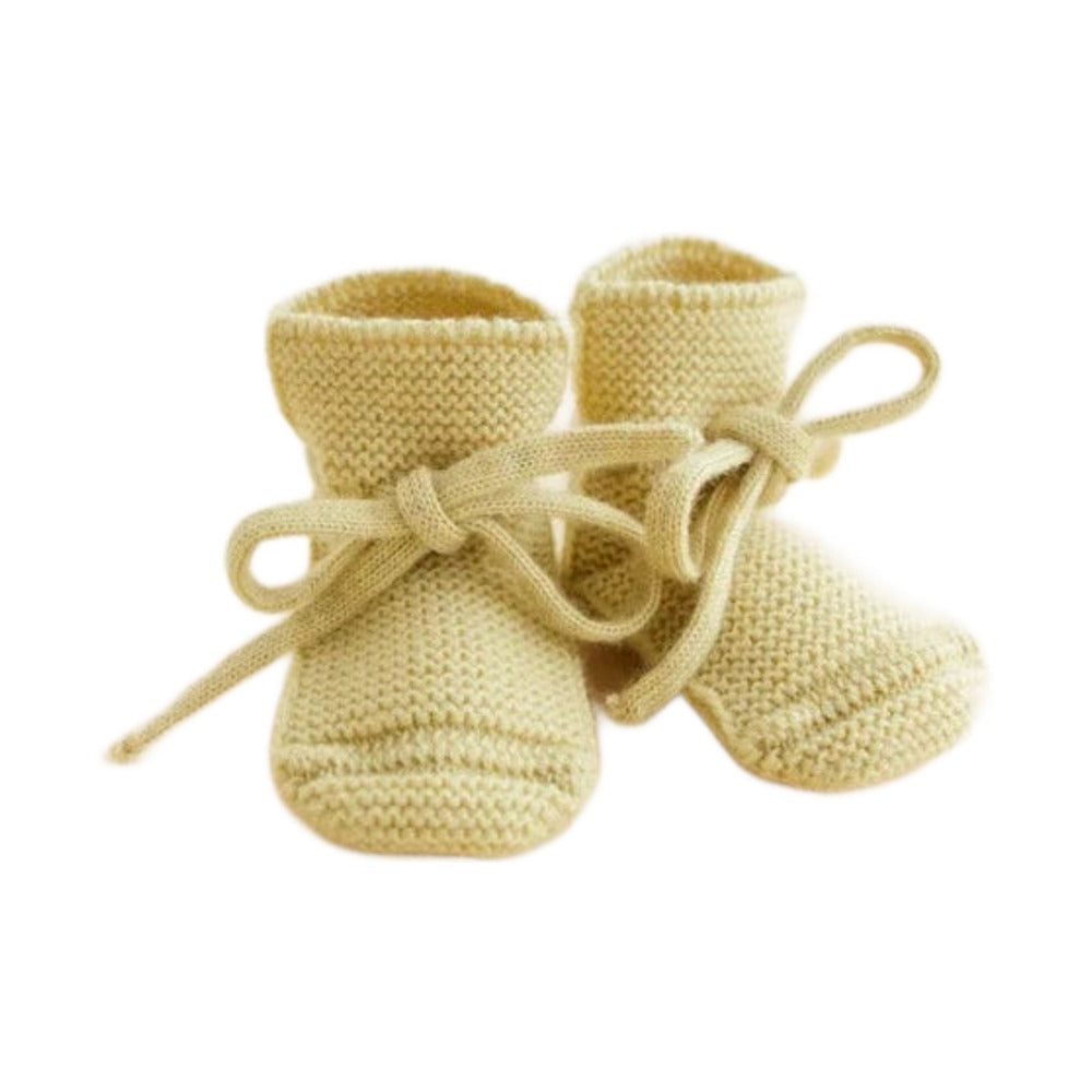 Hvid Booties Light Yellow op witte achtergrond