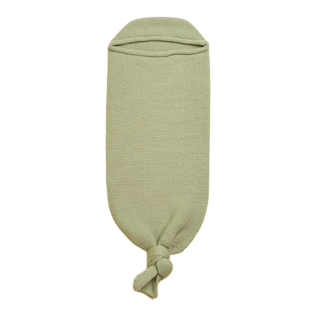 Hvid Cocoon in de kleur Mint van merinowol, te koop bij De Gele Flamingo.