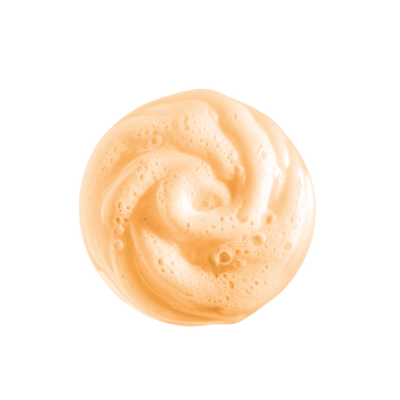 Textuur van het oranje Inuwet doucheschuim perzik