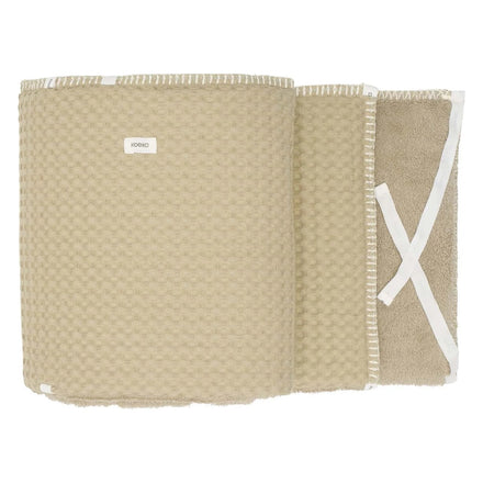 Koeka Boxbumper Wafel Amsterdam in olive, wafelzijde met strikbandjes op witte achtergrond