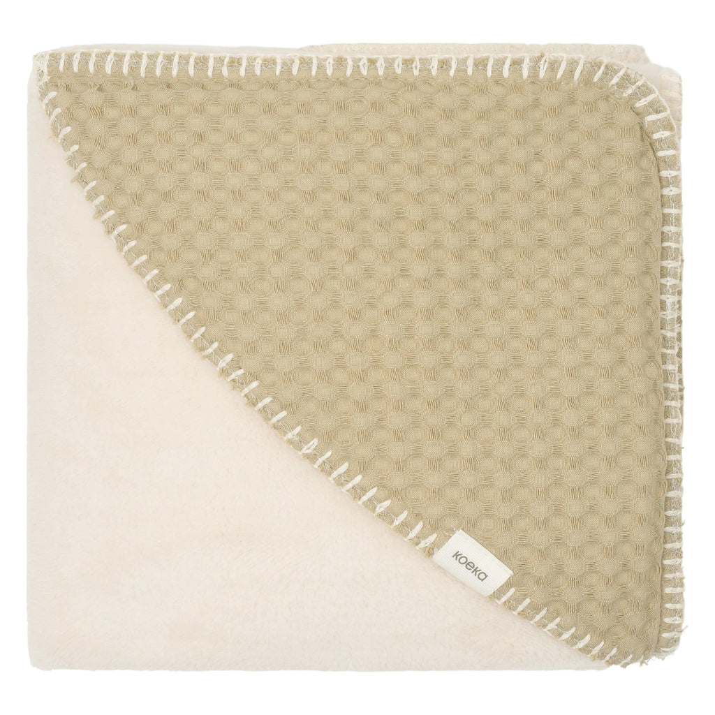 Koeka Omslagdoek Wafel/Teddy Oslo in olive, close-up van wafelstof en teddyvoering