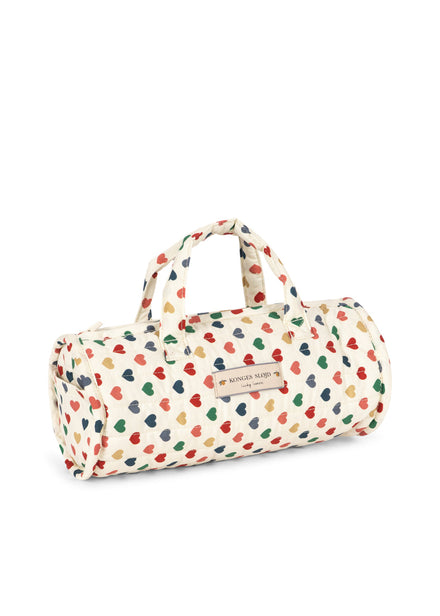 Konges Sløjd Poppenbedje Doll Travel Bed Coeur Coloré, derde productfoto op witte achtergrond