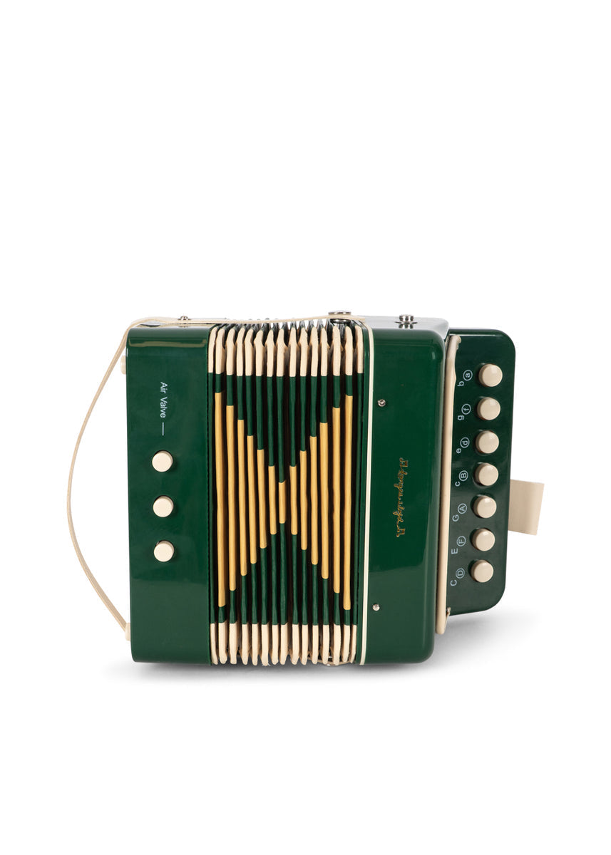 Konges Sløjd Muziekspeelgoed Harmonica Green, groene mondharmonica op witte achtergrond