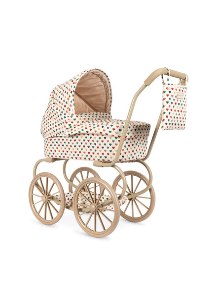Konges Sløjd Poppenwagen Minnie Doll Pram Coeur Coloré, poppenwagen op witte achtergrond