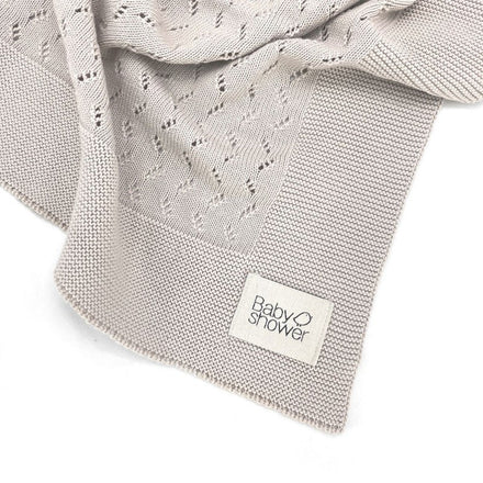 Babyshower Wiegdeken Tricot Classic Beige, close-up van de afwerking aan de rand