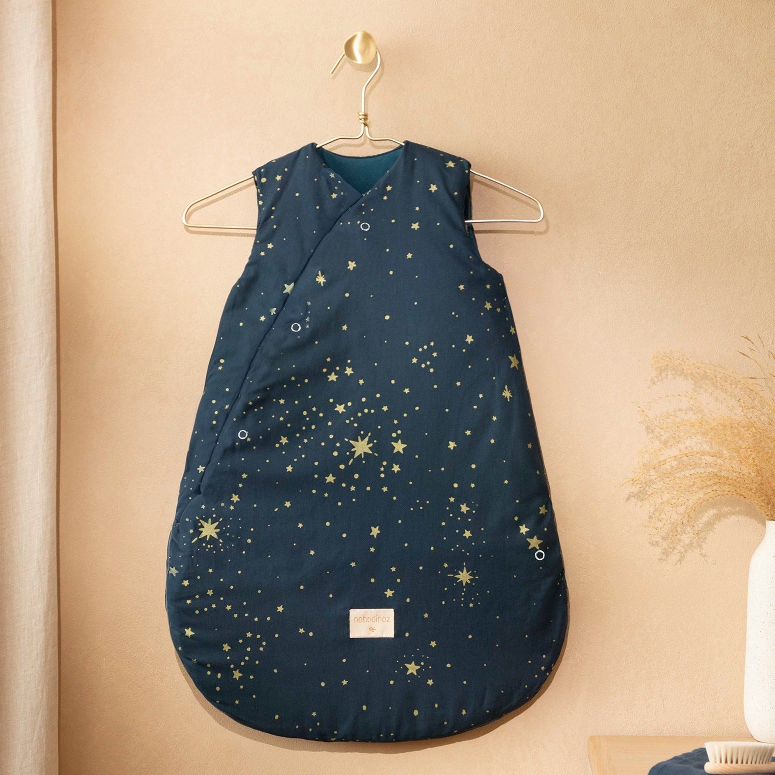 *  Nobodinoz Snowy Warm Winterslaapzak 0-6M | Gold Stella / Night Blue